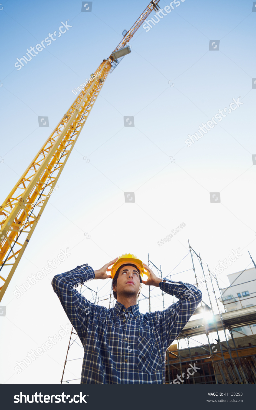 construction worker wearing hard hat.